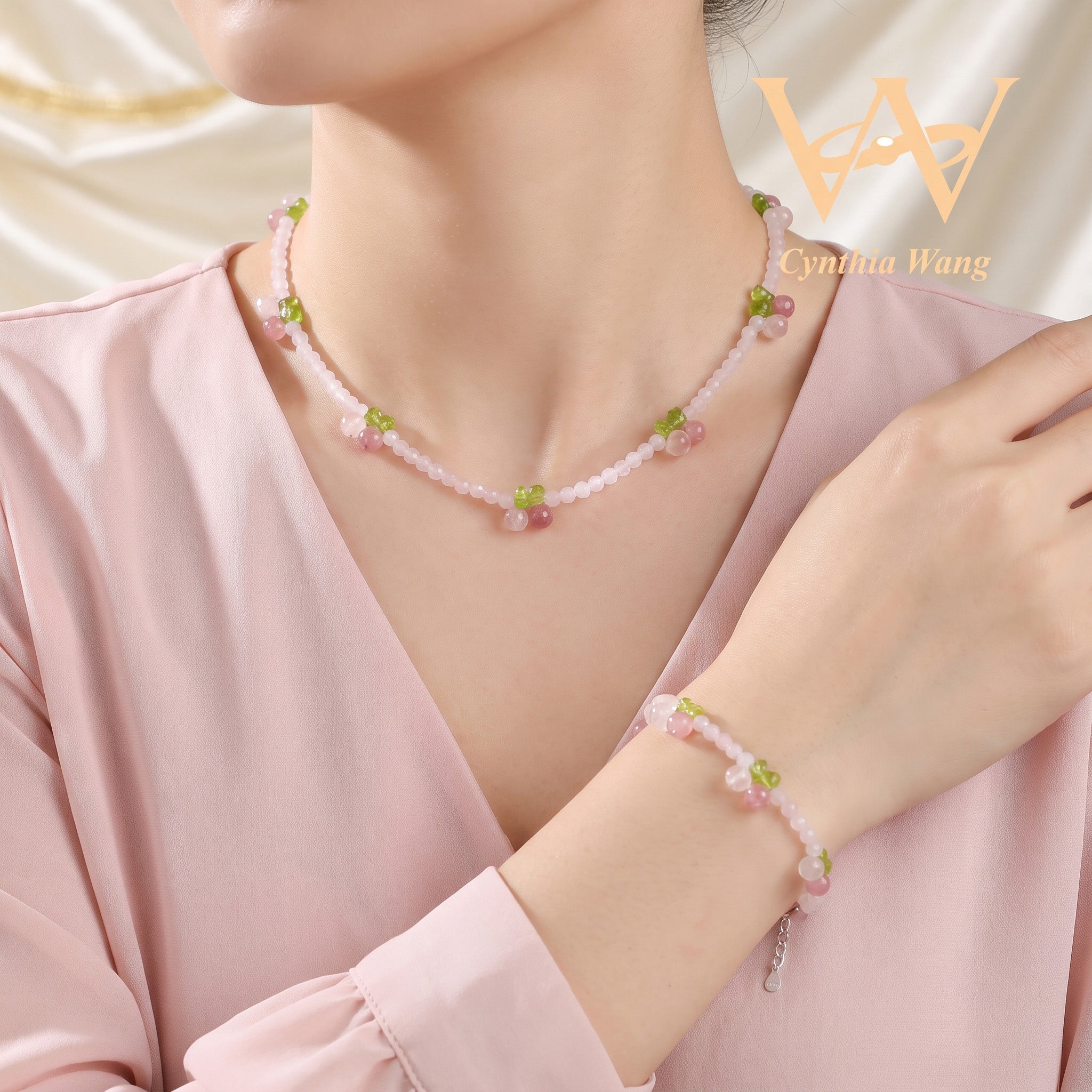 Model wearing Cynthia Wang Rose Quartz Cherry Gemstone Necklace and Matching Bracelet